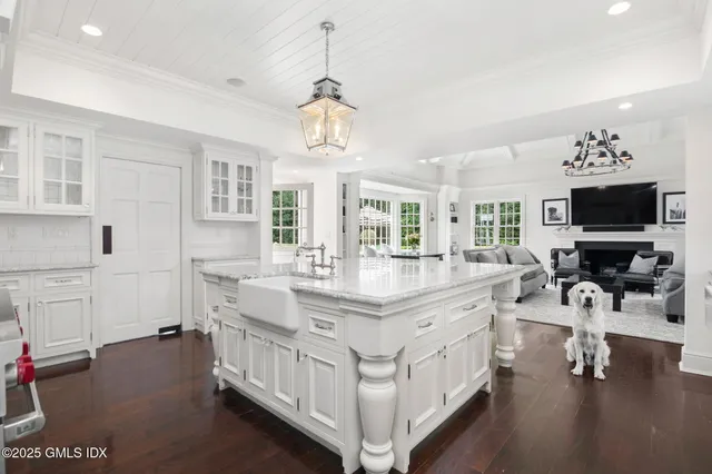 a spacious bathroom with a double vanity sink and a mirror