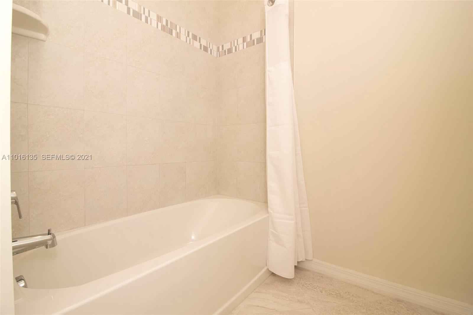 9127 Passiflora Way, Unit 201 Boca Raton, FL 33428 - Photo 27 of 31 2nd bathroom