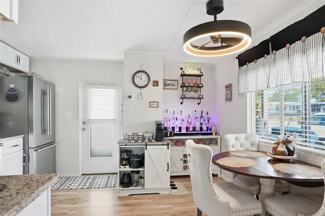 a view of hall way with furniture