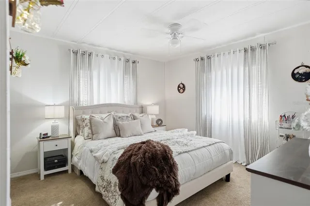 a bathroom with a toilet a sink and shower