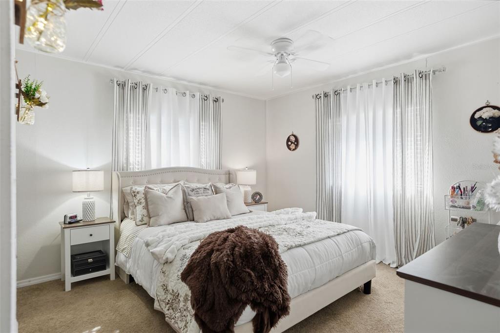 8055 Country Club Drive Brooksville, FL 34613 - Photo 24 of 33 a bedroom with a bed and a window