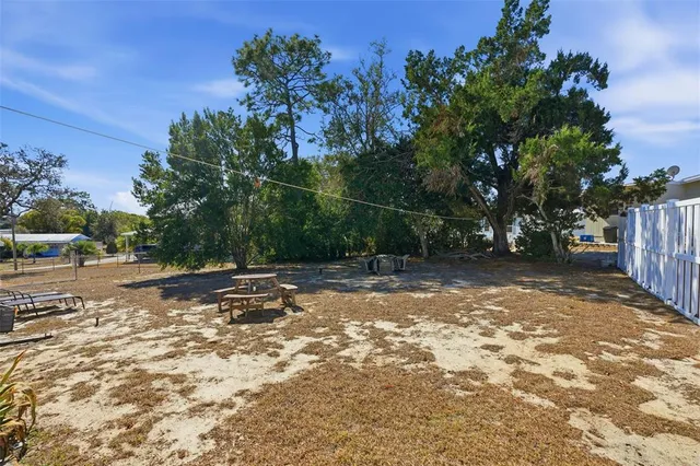 a view of balcony with furniture and a grill