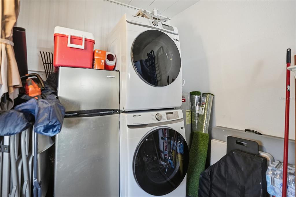 8055 Country Club Drive Brooksville, FL 34613 - Photo 31 of 33 a utility room with dryer and washer
