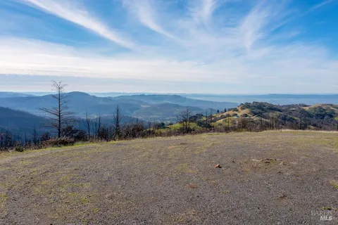 a view of an outdoor space and mountain view