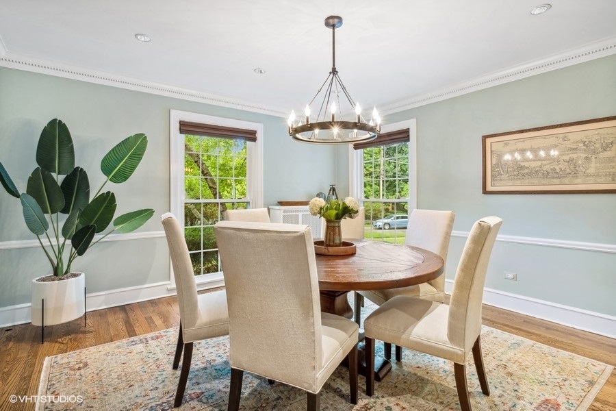 210 Franklin Road Glencoe, IL 60022 - Photo 8 of 33 a view of a dining room with furniture window and wooden floor