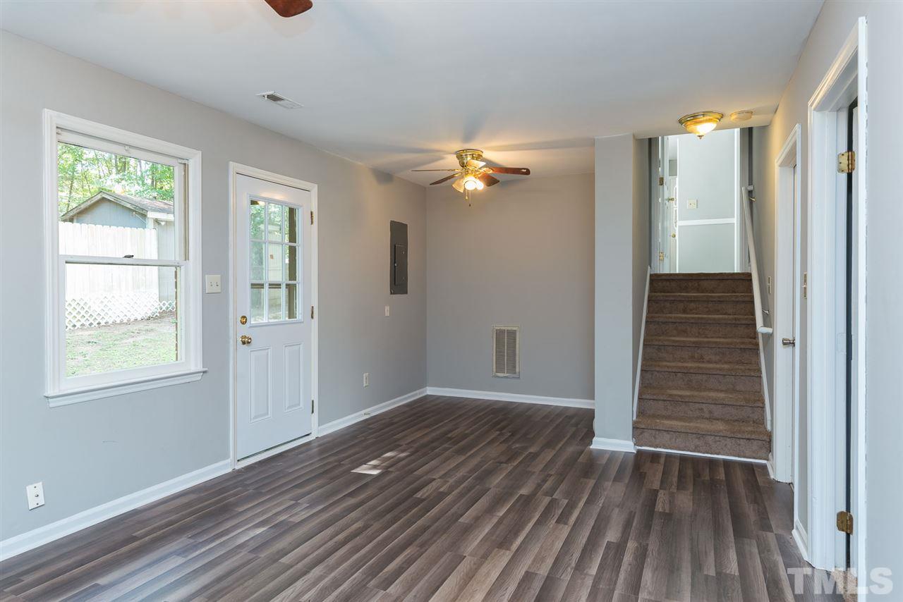 4216 Labrador Drive Raleigh, NC 27616 - Photo 16 of 20 wooden floor in an empty room with a window