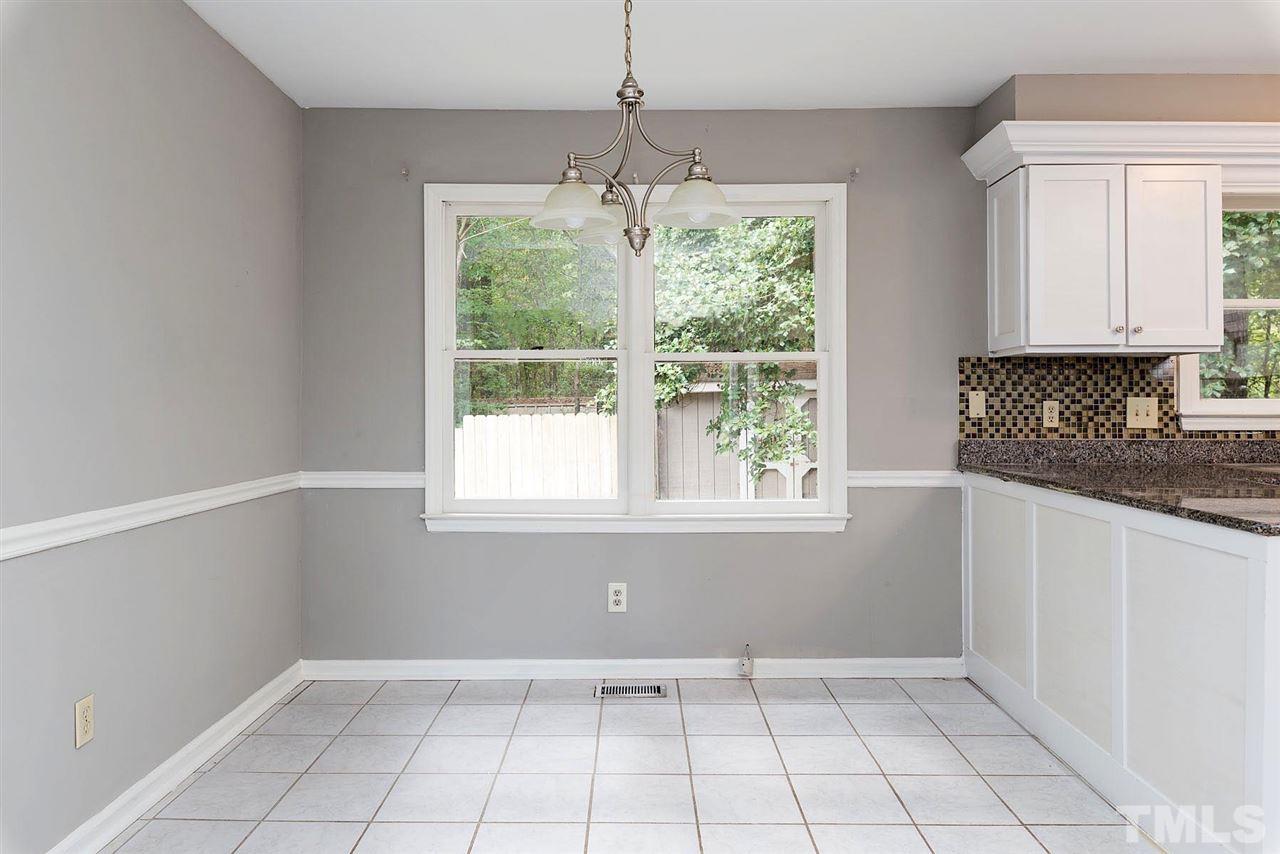 4216 Labrador Drive Raleigh, NC 27616 - Photo 5 of 20 a view of an empty room with a window