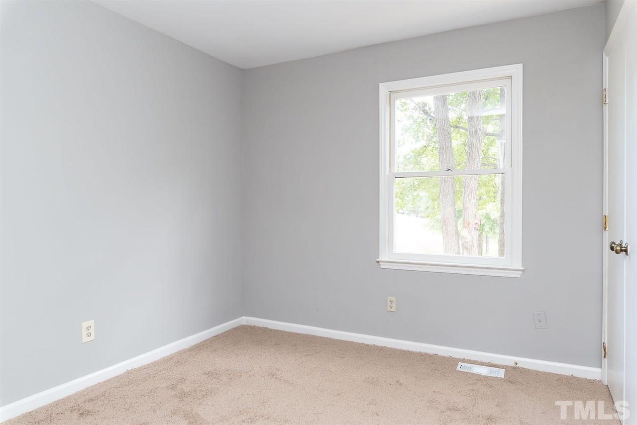 4216 Labrador Drive Raleigh, NC 27616 - Photo 9 of 20 an empty room with a window