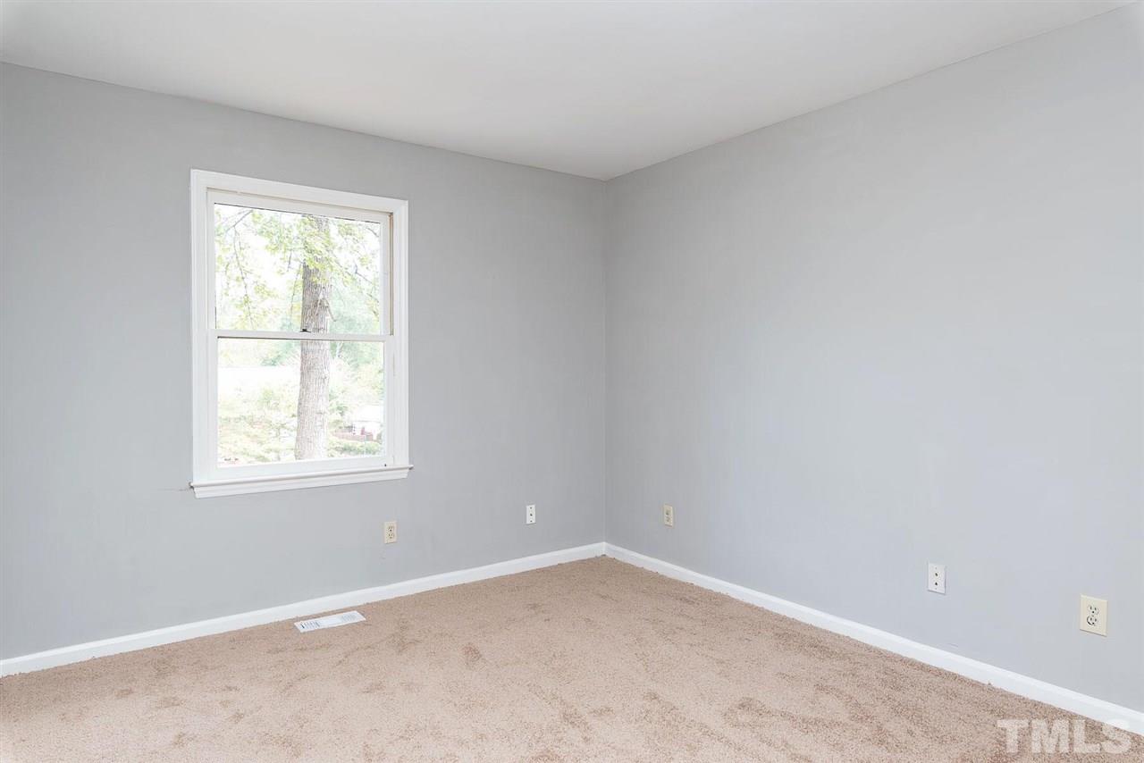 4216 Labrador Drive Raleigh, NC 27616 - Photo 10 of 20 an empty room with a window