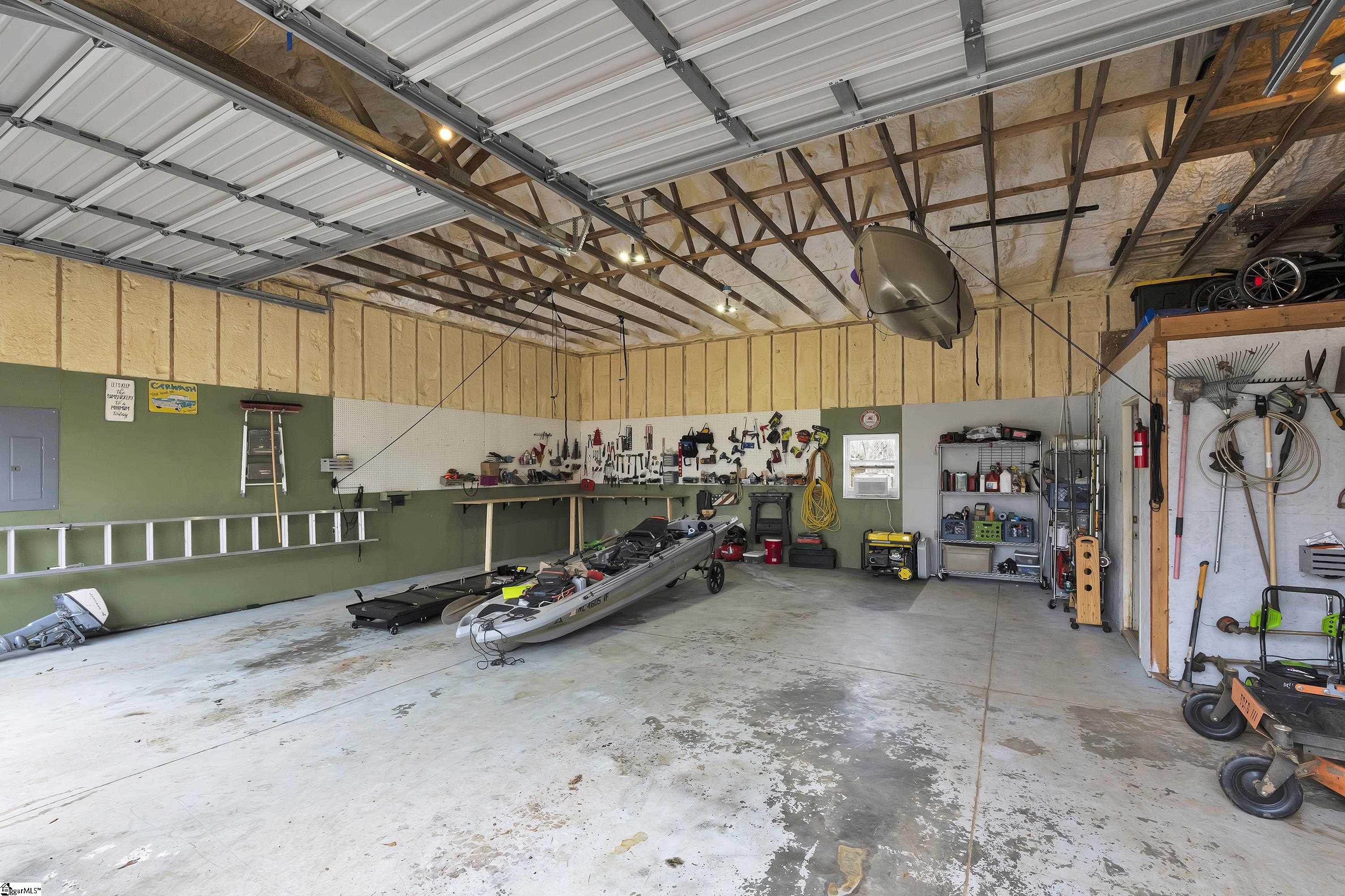 130 Graystone Drive Moore, SC 29369 - Photo 44 of 49 1200Sf with 14 Ft Roll-up doors + 30amp RV hookup