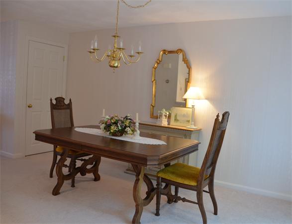 9 Oak Ridge Drive, Unit 5 Maynard, MA 01754 - Photo 7 of 20 a view of a dining room with furniture