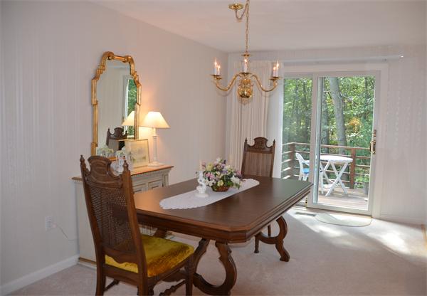 9 Oak Ridge Drive, Unit 5 Maynard, MA 01754 - Photo 8 of 20 a view of a dining room with furniture window and outside view