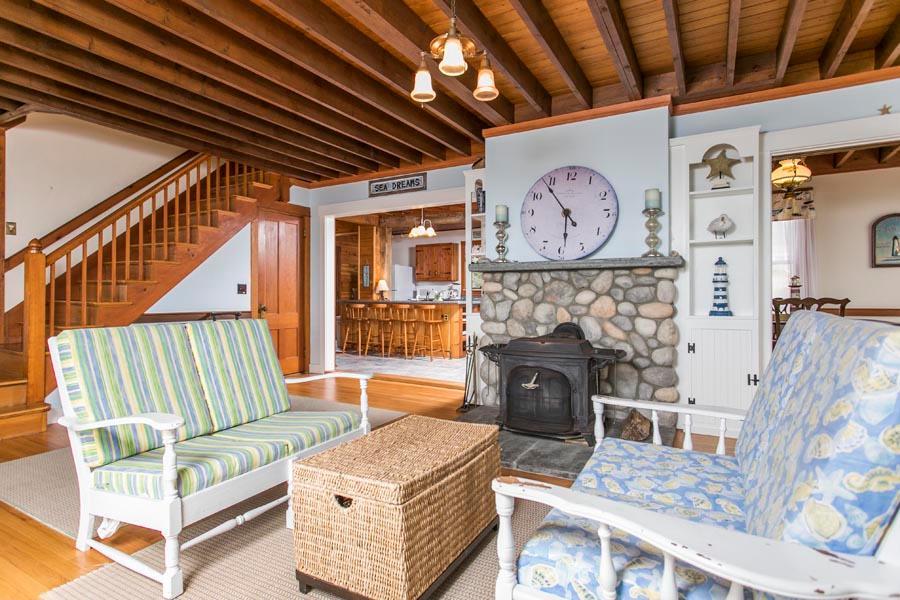 22 Spring Street East Boothbay, ME 04544 - Photo 9 of 27 The living room, with stone hearth...
