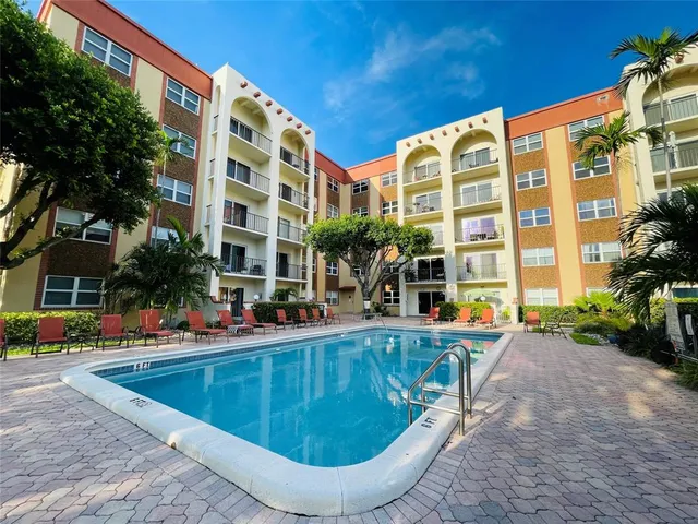 a view of a building with a swimming pool