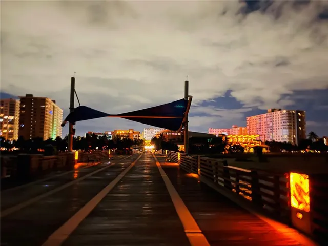 a view of a street with sitting area