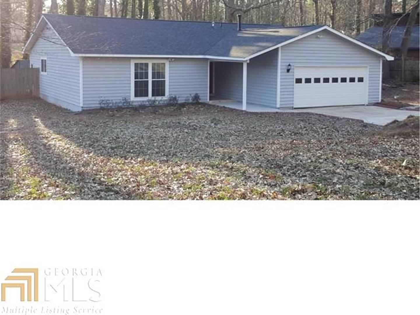 185 Chimney Ridge Trail Stockbridge, GA 30281 - Photo 1 of 1 a black and white photo of a house