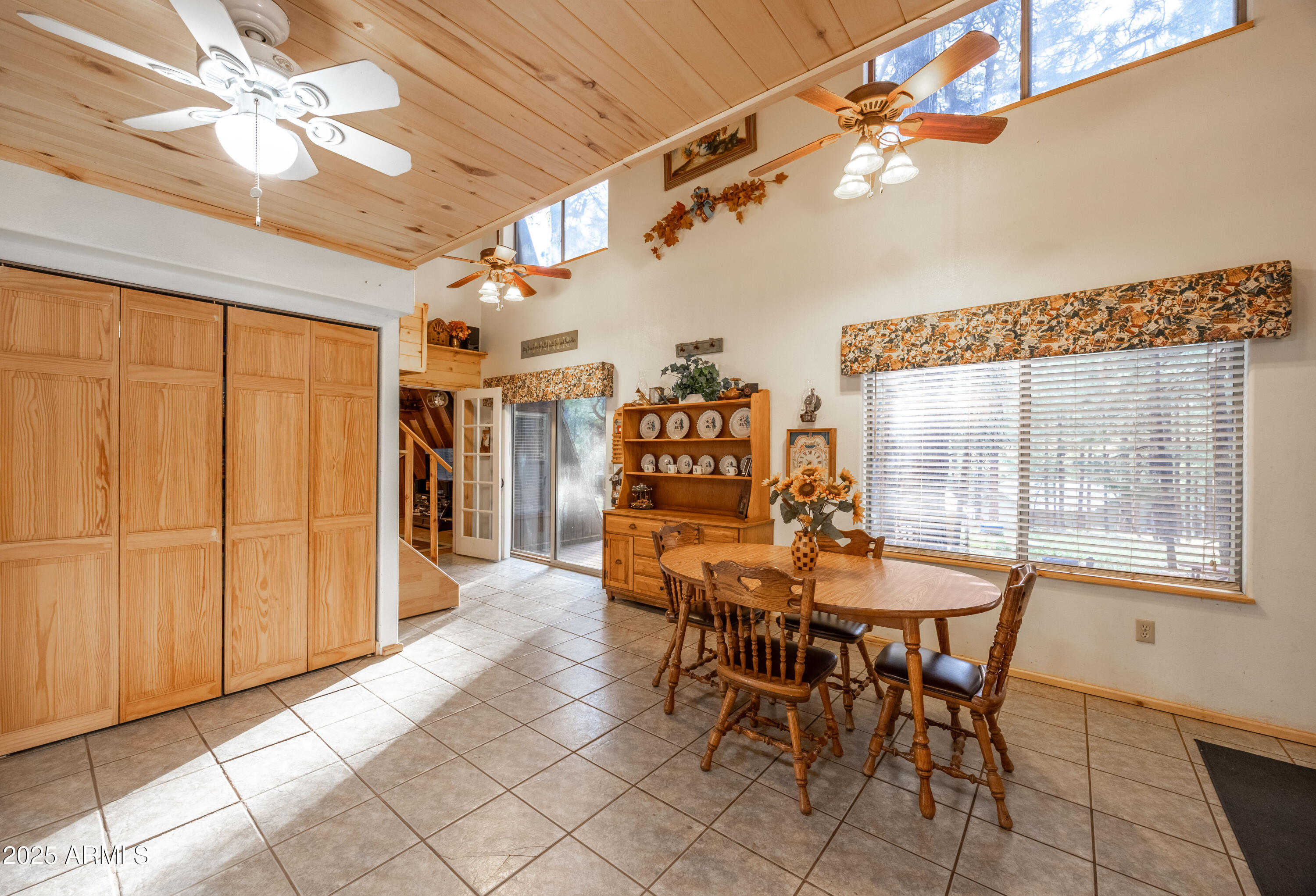 1643 Rifle Way Forest Lakes, AZ 85931 - Photo 12 of 40 a view of a dining room with furniture and chandelier
