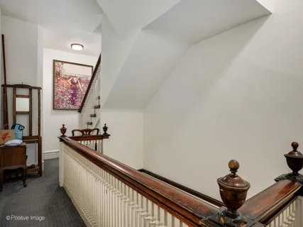 a view of a hallway with workspace