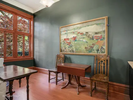 a workspace with furniture and a window