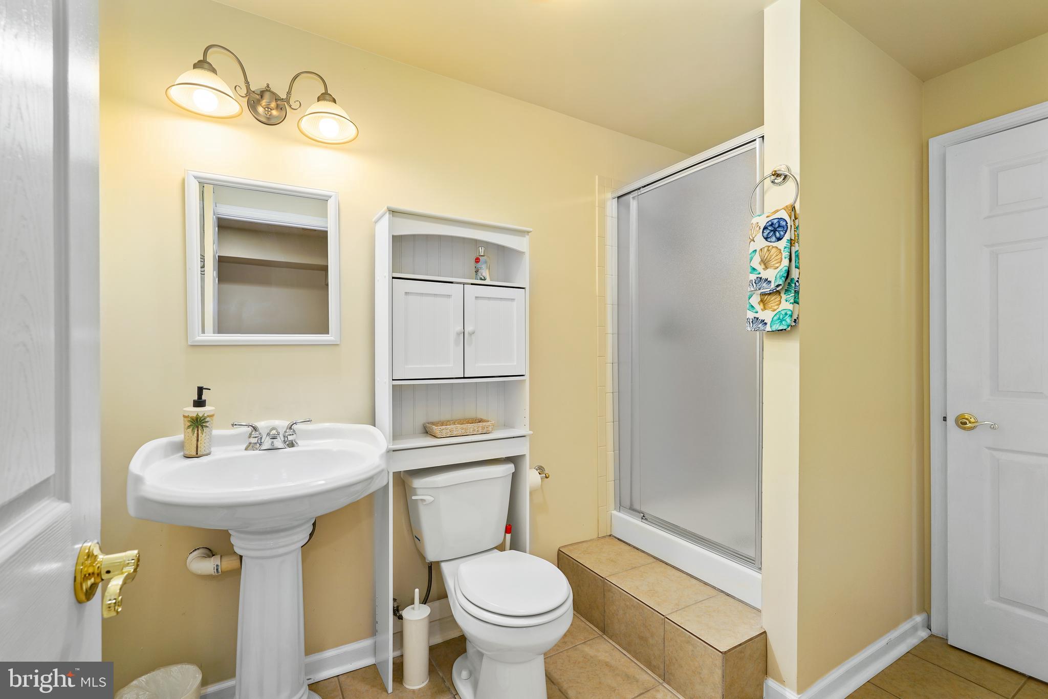 41 Austins Way Elkton, MD 21921 - Photo 40 of 47 a bathroom with a sink toilet and shower
