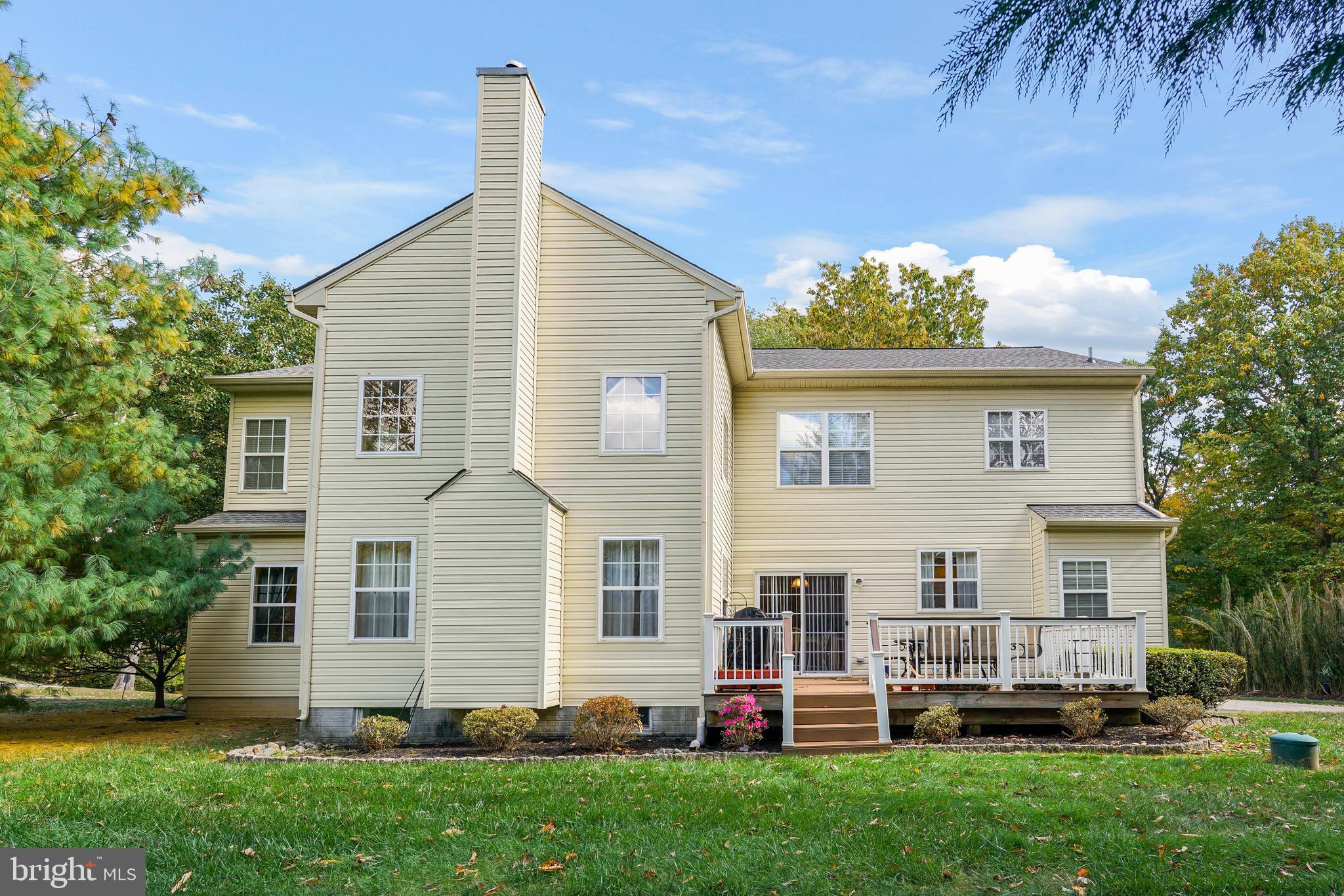 41 Austins Way Elkton, MD 21921 - Photo 42 of 47 a front view of a house with a garden and plants