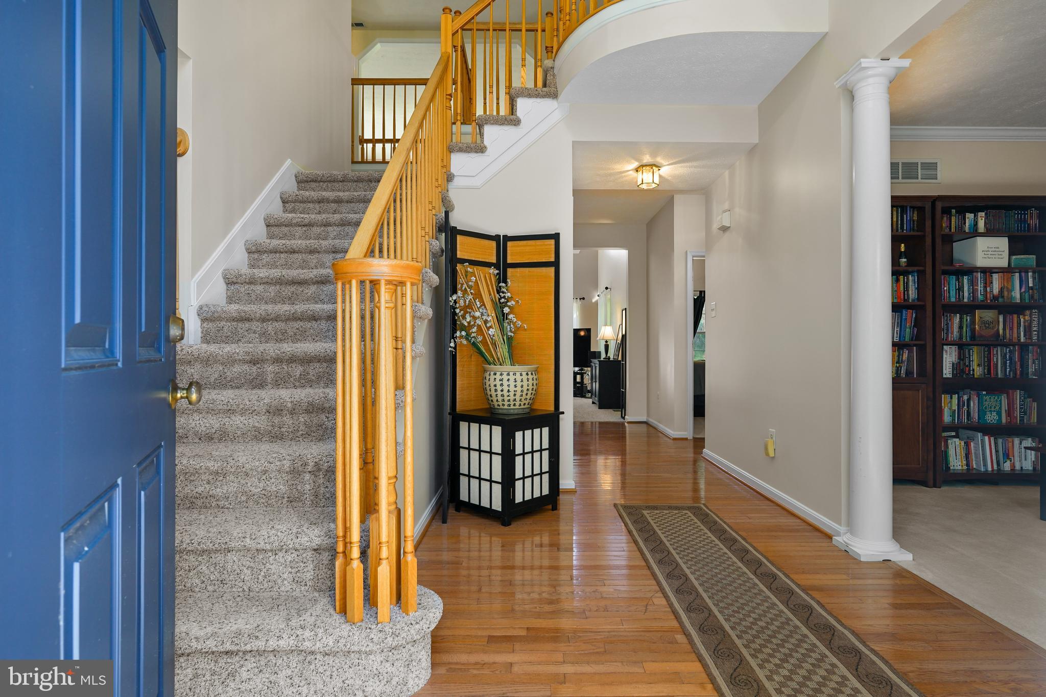 41 Austins Way Elkton, MD 21921 - Photo 6 of 47 a view of a hallway with wooden floor and staircase