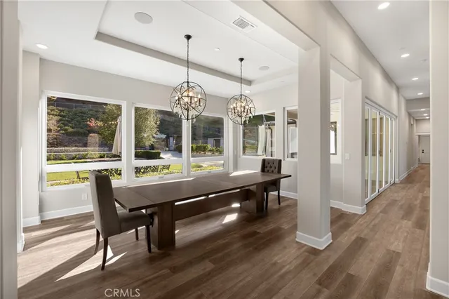 a room with a sink and a washer dryer
