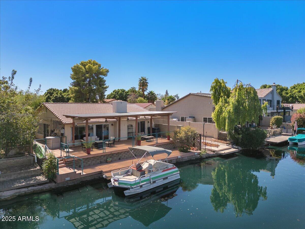 5532 South Crows Nest Road Tempe, AZ 85283 - Photo 2 of 2 a small pool with couple of trees in the background