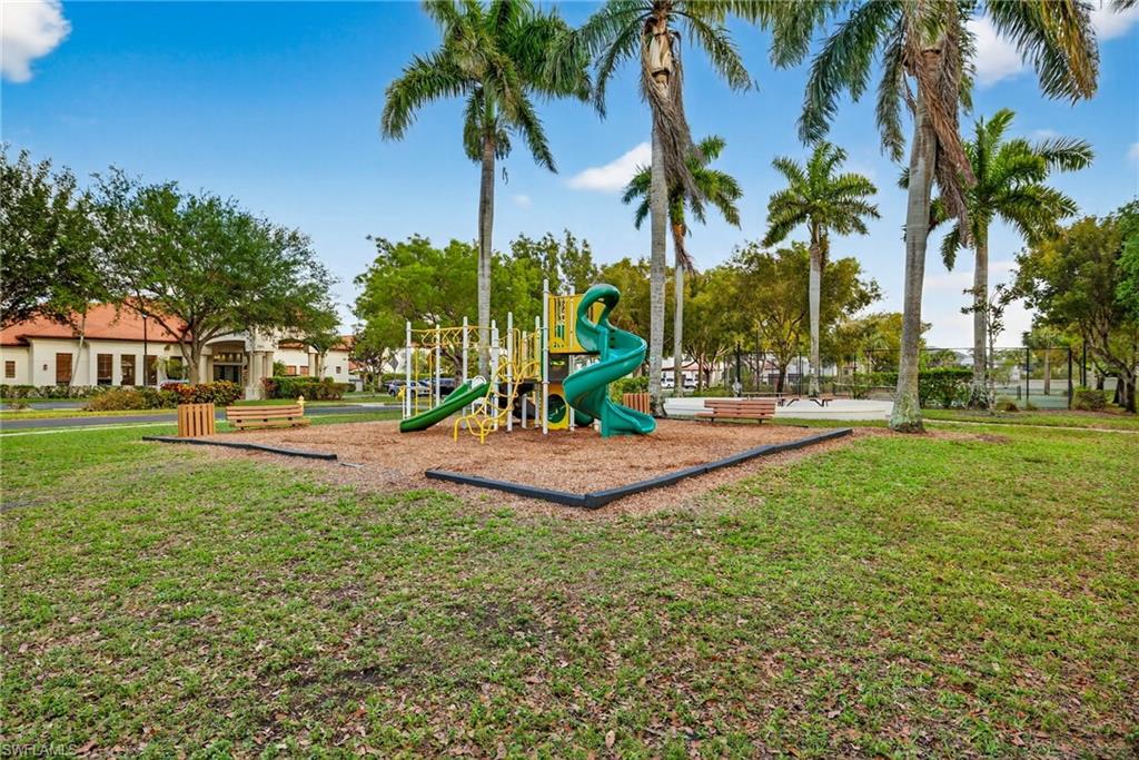7845 Bristol Circle Naples, FL 34120 - Photo 30 of 31 a view of outdoor space with palm trees