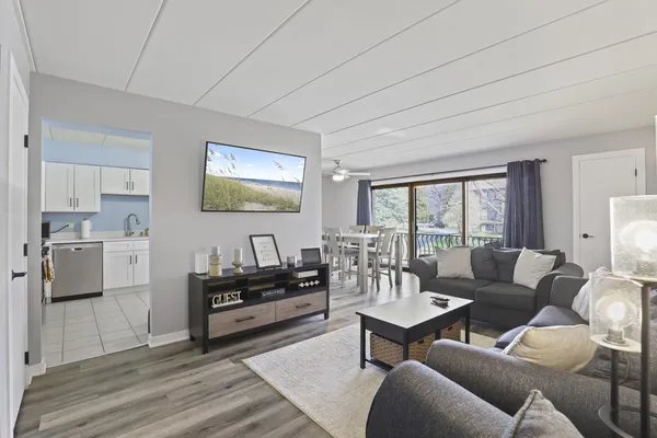 a living room with furniture and a table