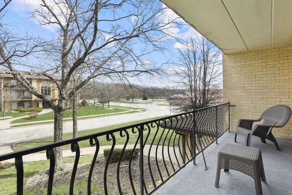 a view of balcony with furniture