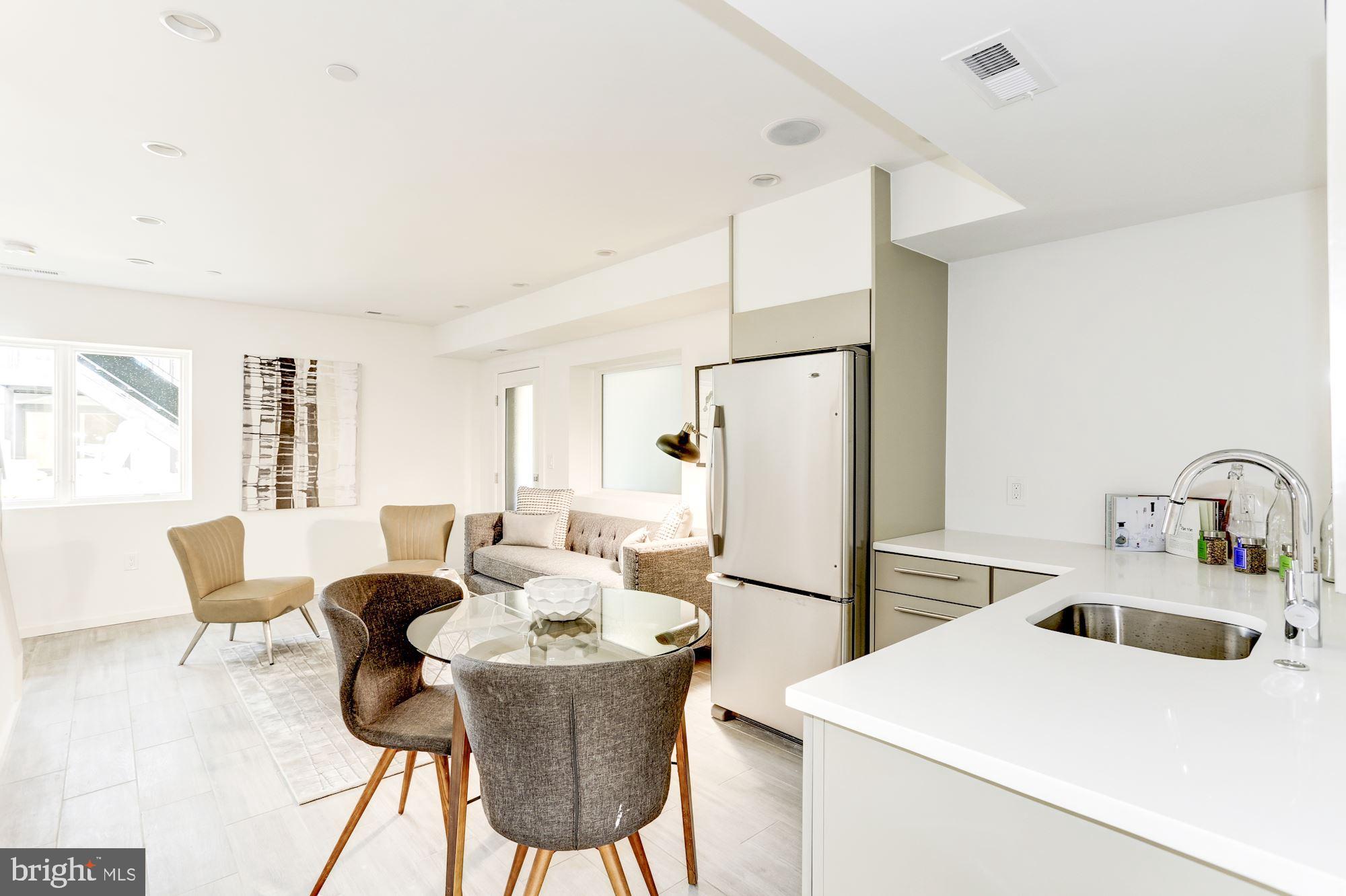 20 Channing Street Northwest, Unit 2 Washington, DC 20001 - Photo 28 of 35 1st level family room and kitchenette