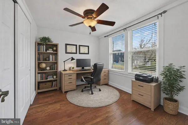 a workspace with furniture and window
