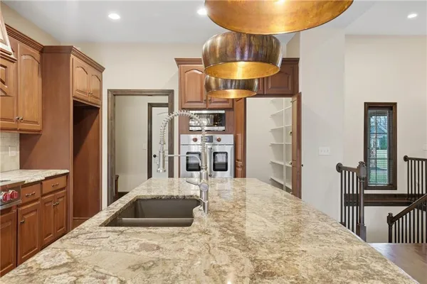 $895,000 | 6205 Northwest Saddle Club Court, Kansas City, MO 64152
