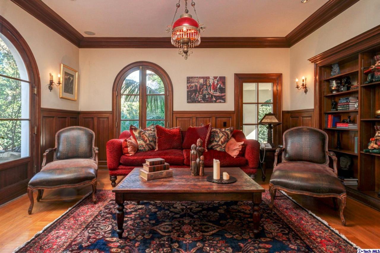 1680 Lombardy Road Pasadena, CA 91106 - Photo 25 of 71 a living room with fireplace furniture and a large window