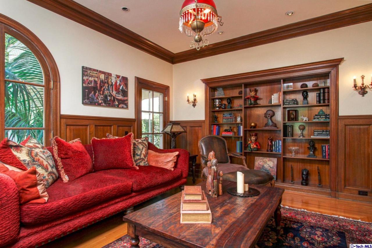 1680 Lombardy Road Pasadena, CA 91106 - Photo 26 of 71 a living room with furniture a bookshelf and a large window