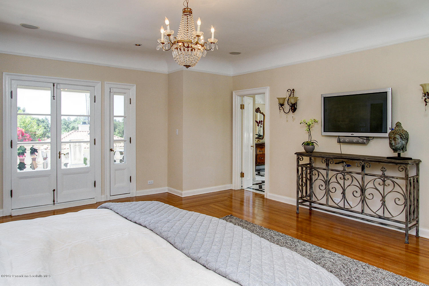 1680 Lombardy Road Pasadena, CA 91106 - Photo 33 of 71 a bedroom with furniture and flat screen tv