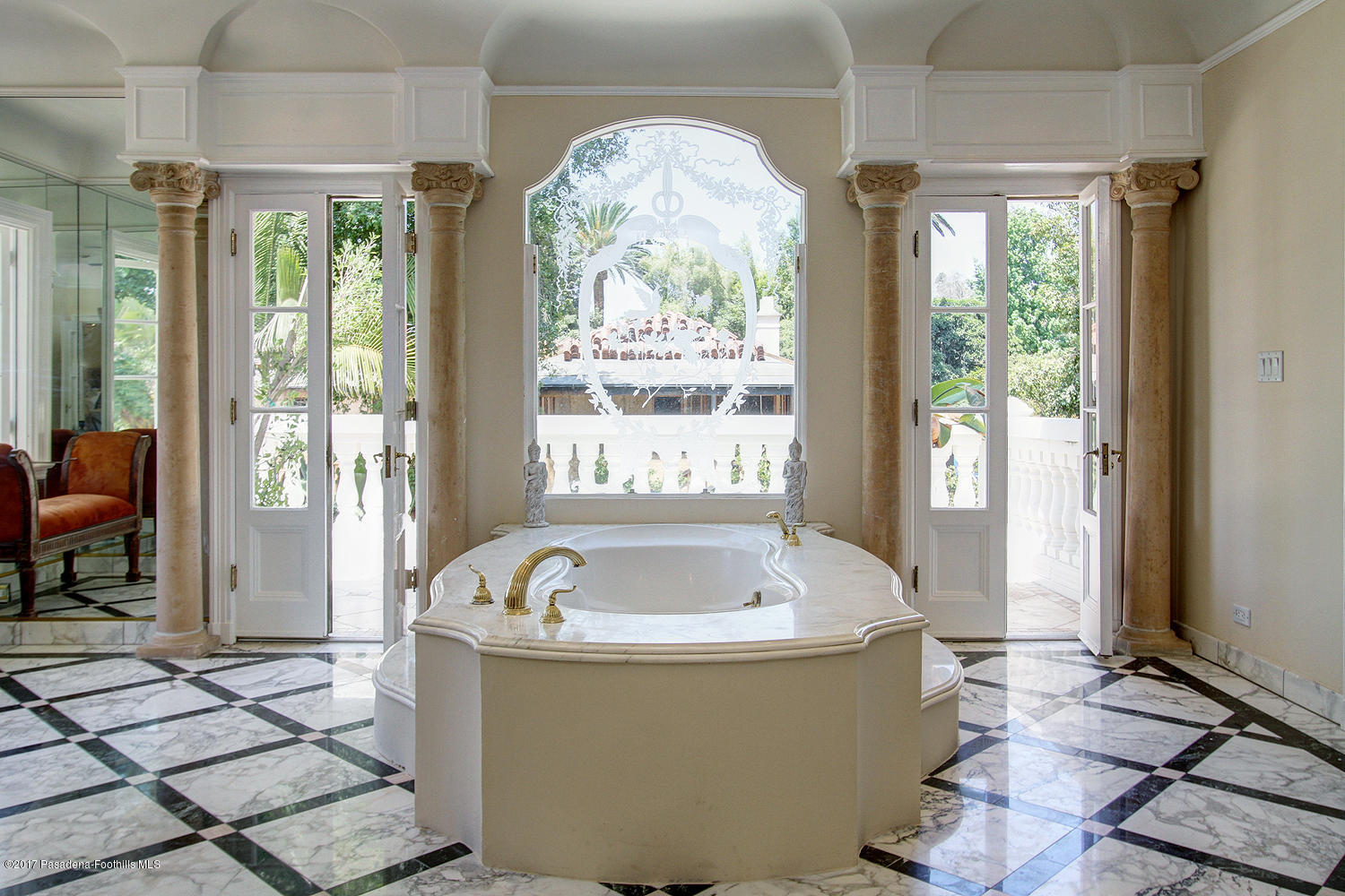 1680 Lombardy Road Pasadena, CA 91106 - Photo 35 of 71 a bath tub sitting in a bathroom next to a window