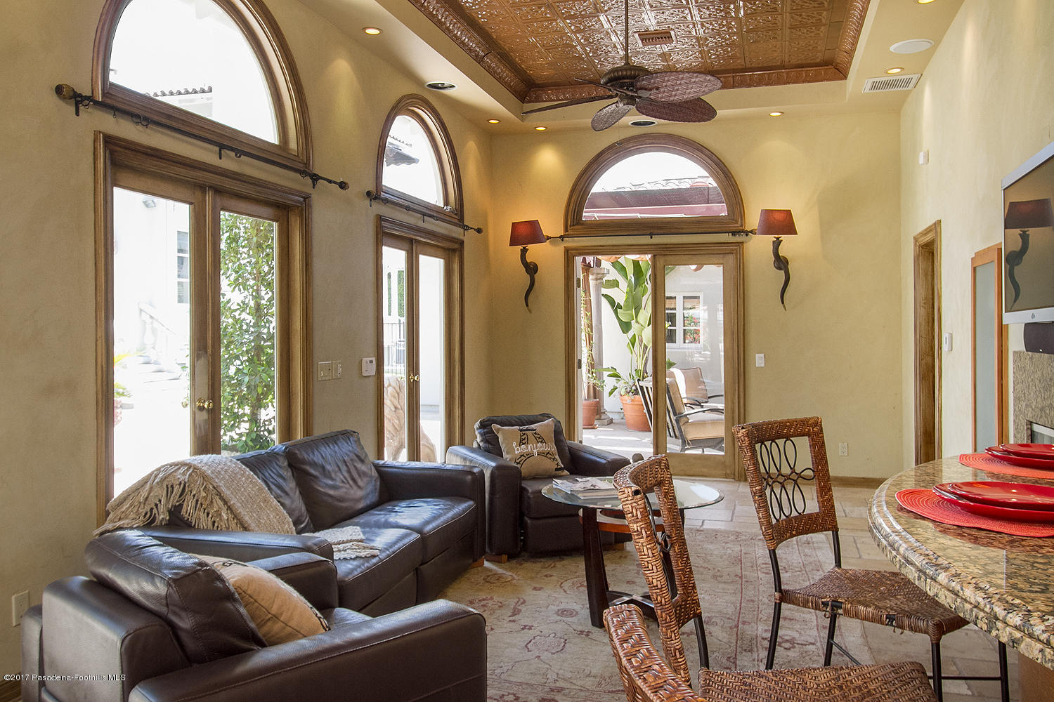 1680 Lombardy Road Pasadena, CA 91106 - Photo 53 of 71 a living room with furniture and a large mirror