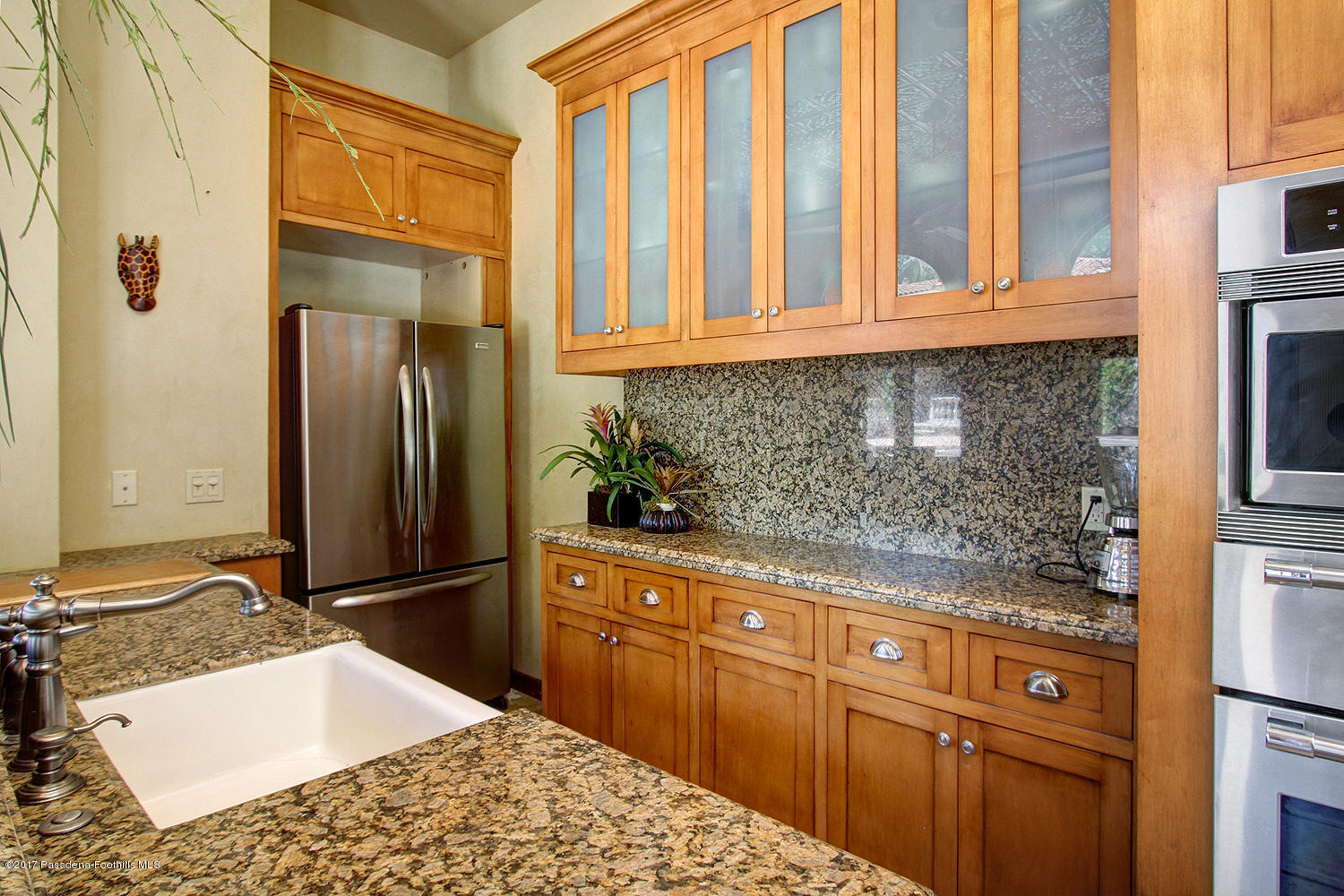 1680 Lombardy Road Pasadena, CA 91106 - Photo 54 of 71 a bathroom with a sink and a mirror