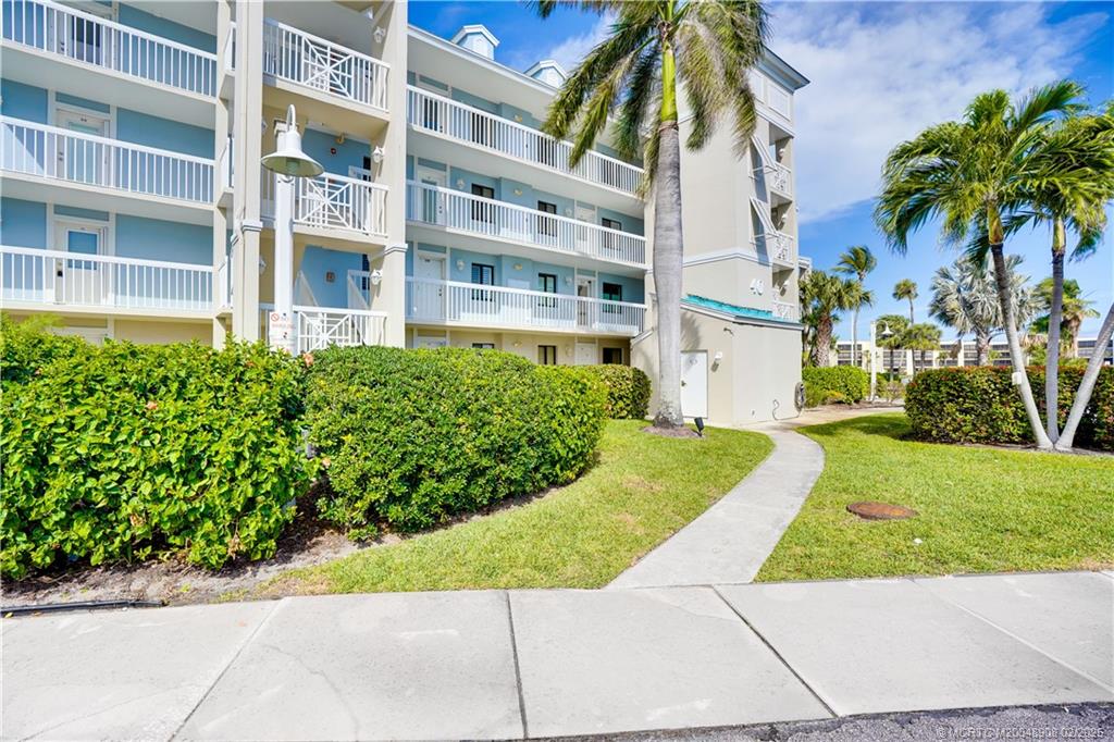 40 Northeast Plantation Road, Unit 415 Stuart, FL 34996 - Photo 32 of 32 a front view of a multi story residential apartment building