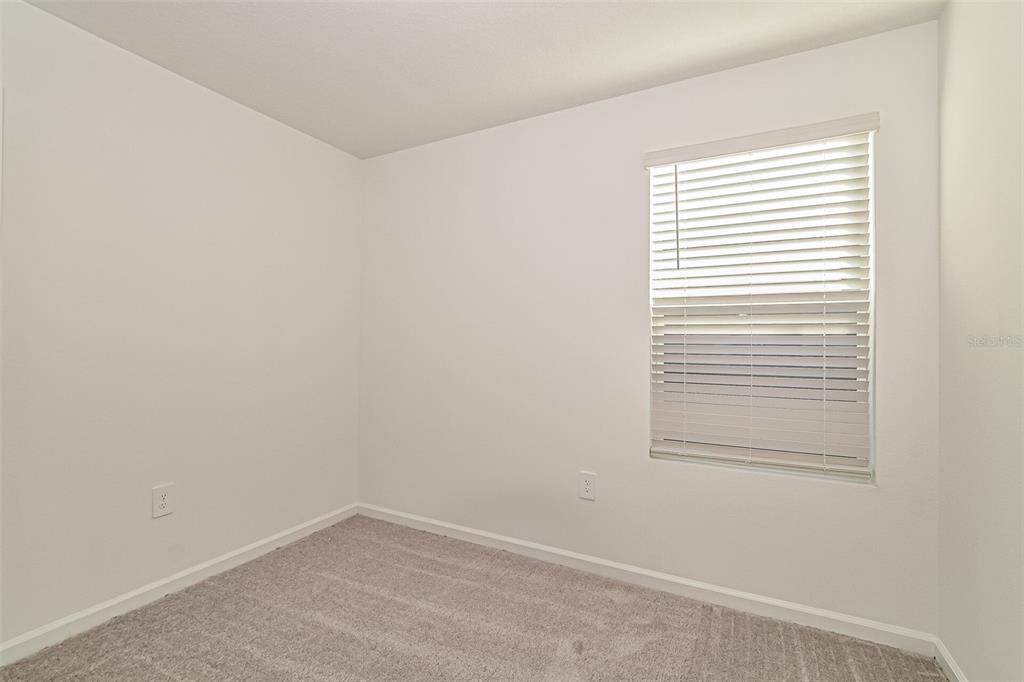 2207 Chris Drive Lake Wales, FL 33859 - Photo 11 of 16 an empty room with a window