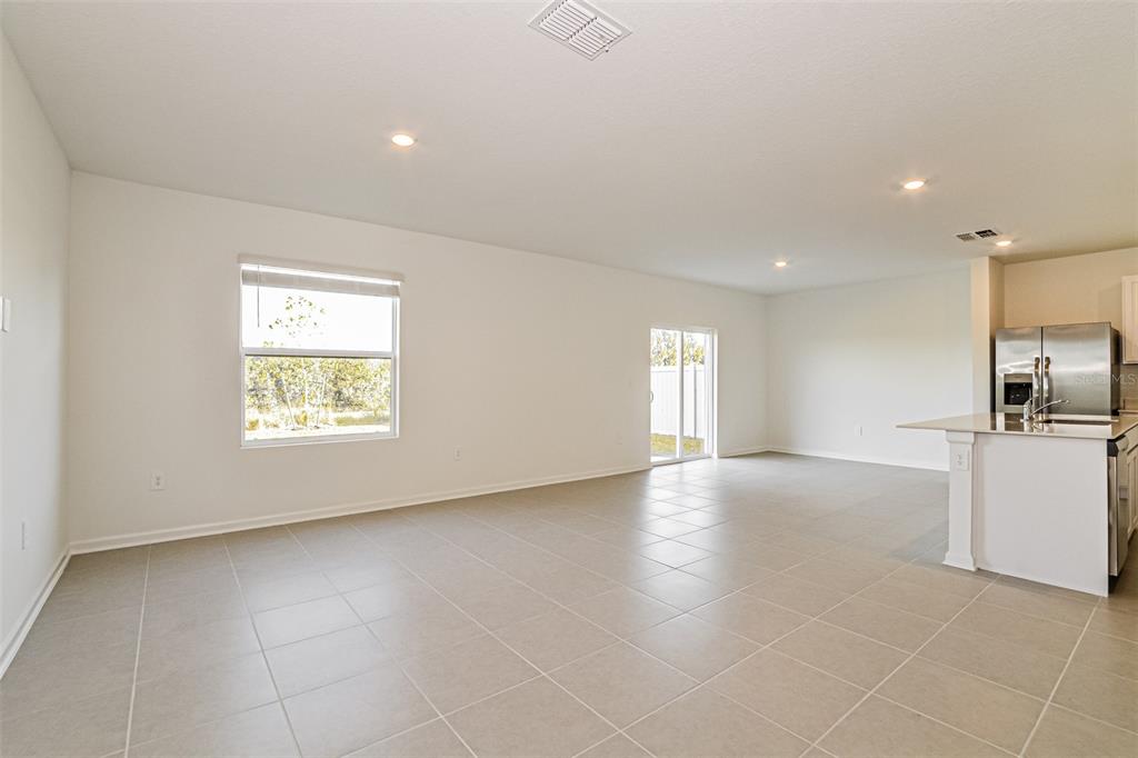 2207 Chris Drive Lake Wales, FL 33859 - Photo 4 of 16 a view of an empty room with a window