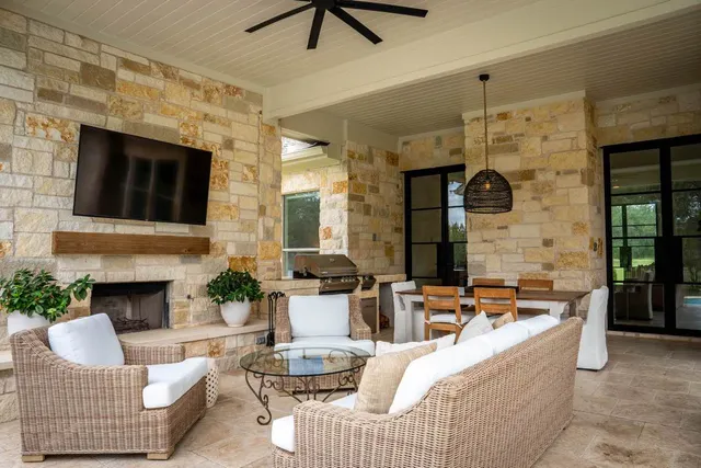 a living room with furniture and a rug