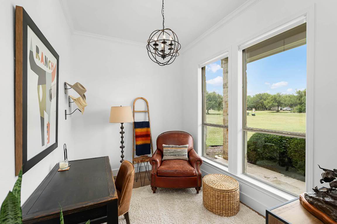 1921 Ruby Ranch Road Buda, TX 78610 - Photo 8 of 36 a living room with furniture and a window