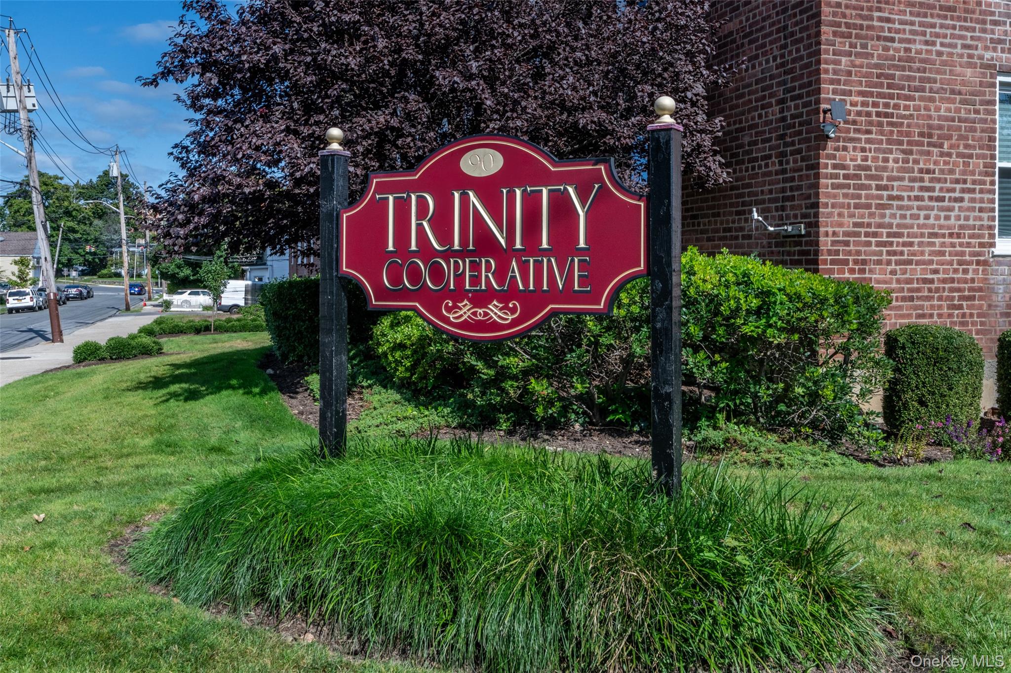 90 Union Street, Unit 1A New Rochelle, NY 10805 - Photo 19 of 28 a sign that is sitting on a brick wall