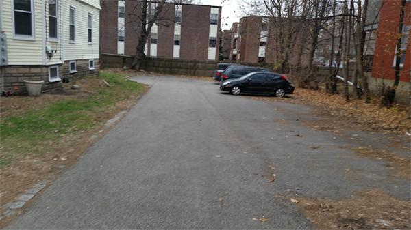 35 Waverly Street, Unit B Boston, MA 02135 - Photo 3 of 13 a car parked in front of a house