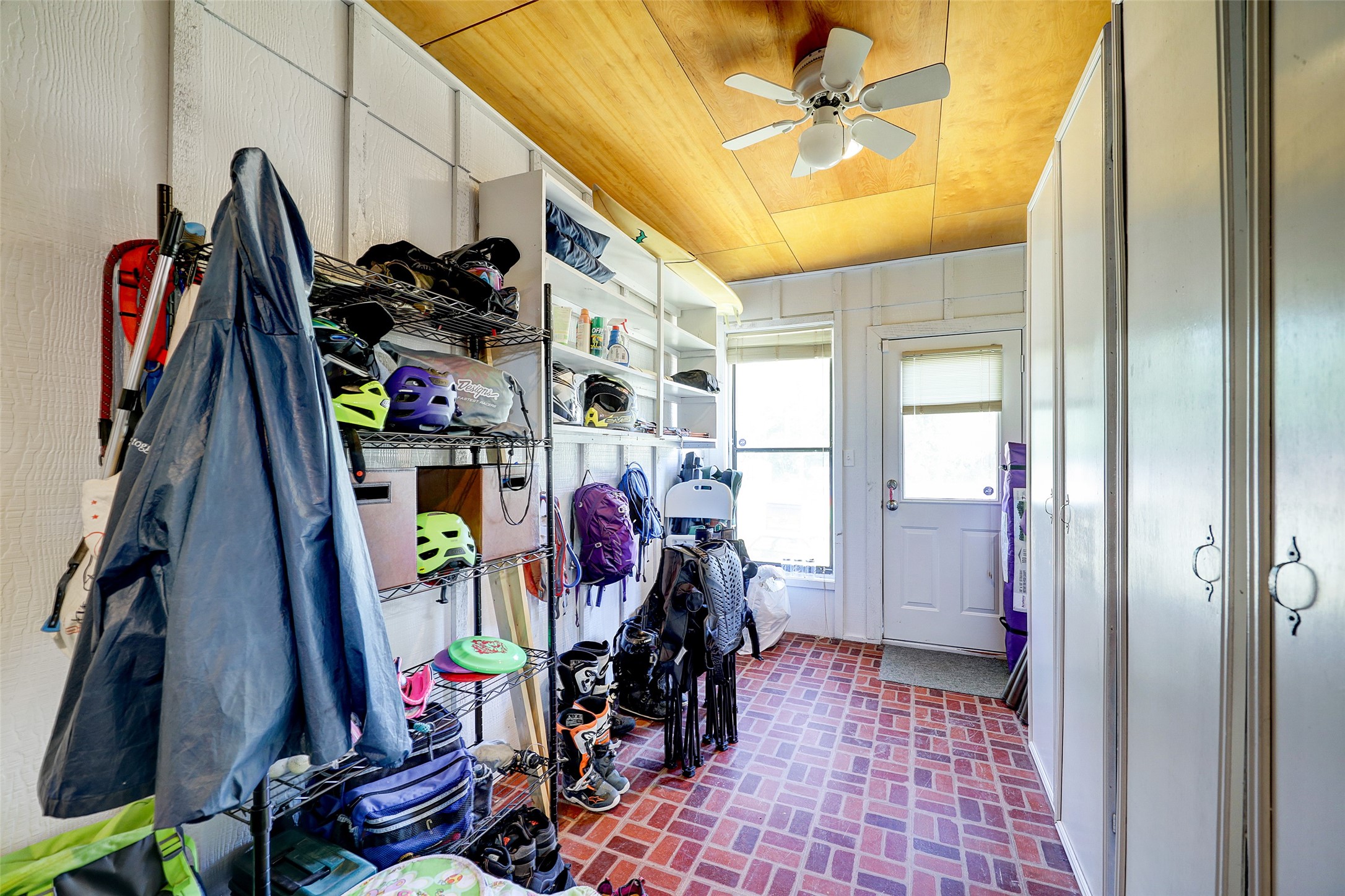 1664 North McCaleb Road Montgomery, TX 77316 - Photo 16 of 23 a view of a closet with storage and utility