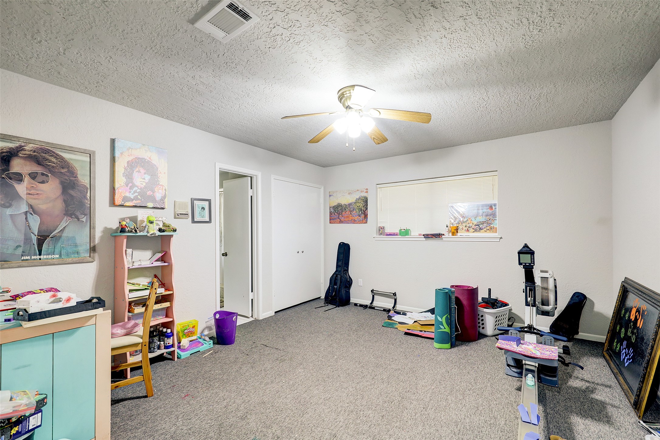 1664 North McCaleb Road Montgomery, TX 77316 - Photo 18 of 23 a view of a room with gym equipment