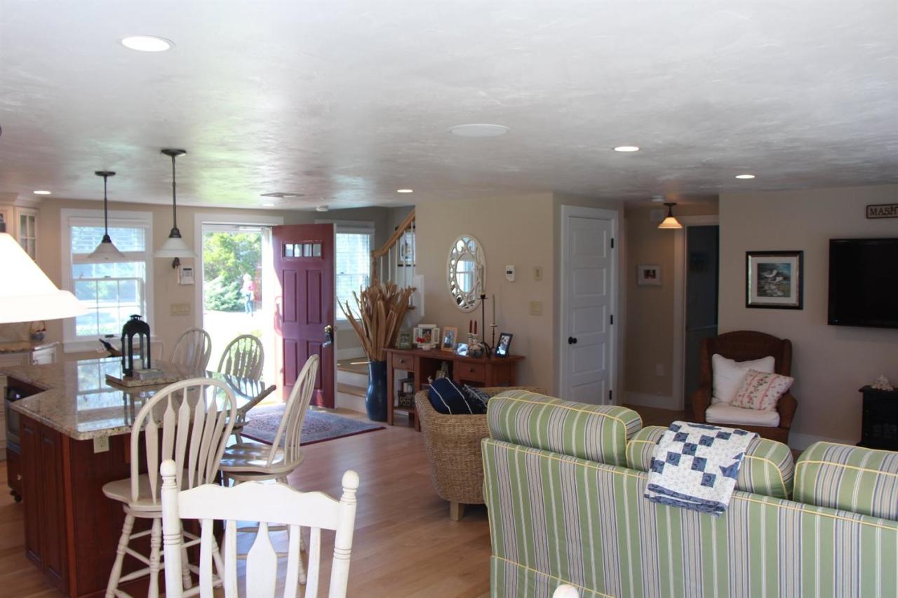 206 Clipper Road Bourne, MA 02532 - Photo 25 of 35 a living room with furniture and wooden floor